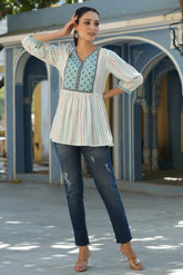 Women Ivory Rayon Staple Striped Printed Peplum Tunic.