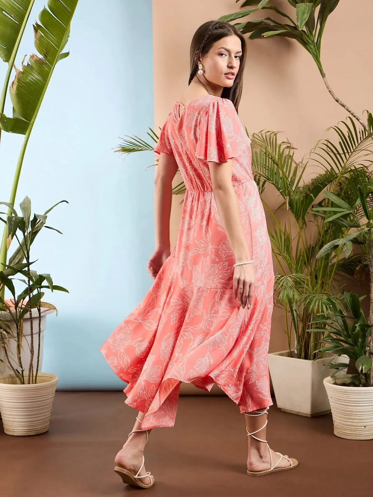 Peach Floral Midi Dress | Asymmetric Hem, Fit & Flare Design Peach Floral Midi Dress | Asymmetric Hem, Fit & Flare Design