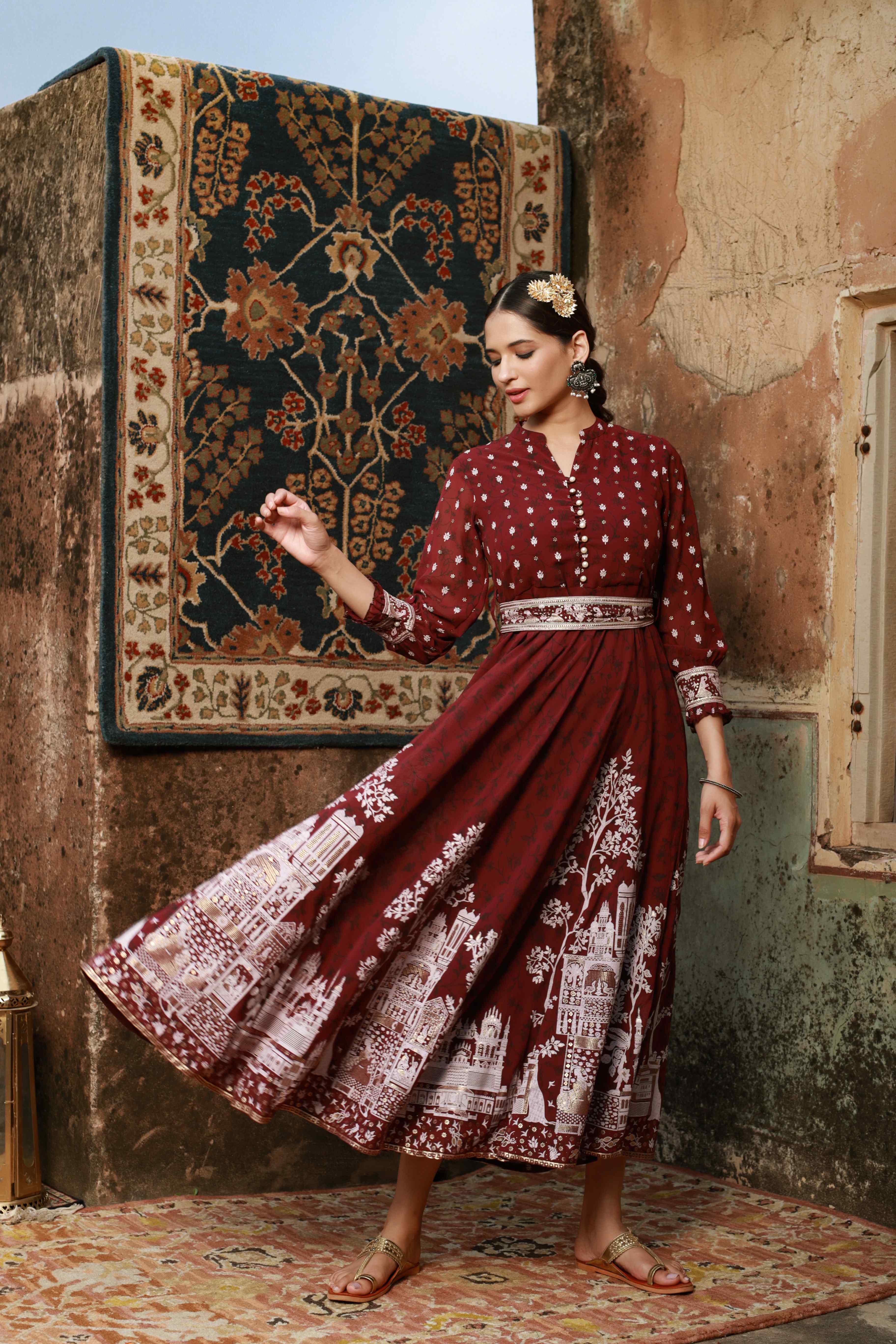 Wine Ethnic Motif Printed Georgette Flared Maxi Dress | DesiQlo