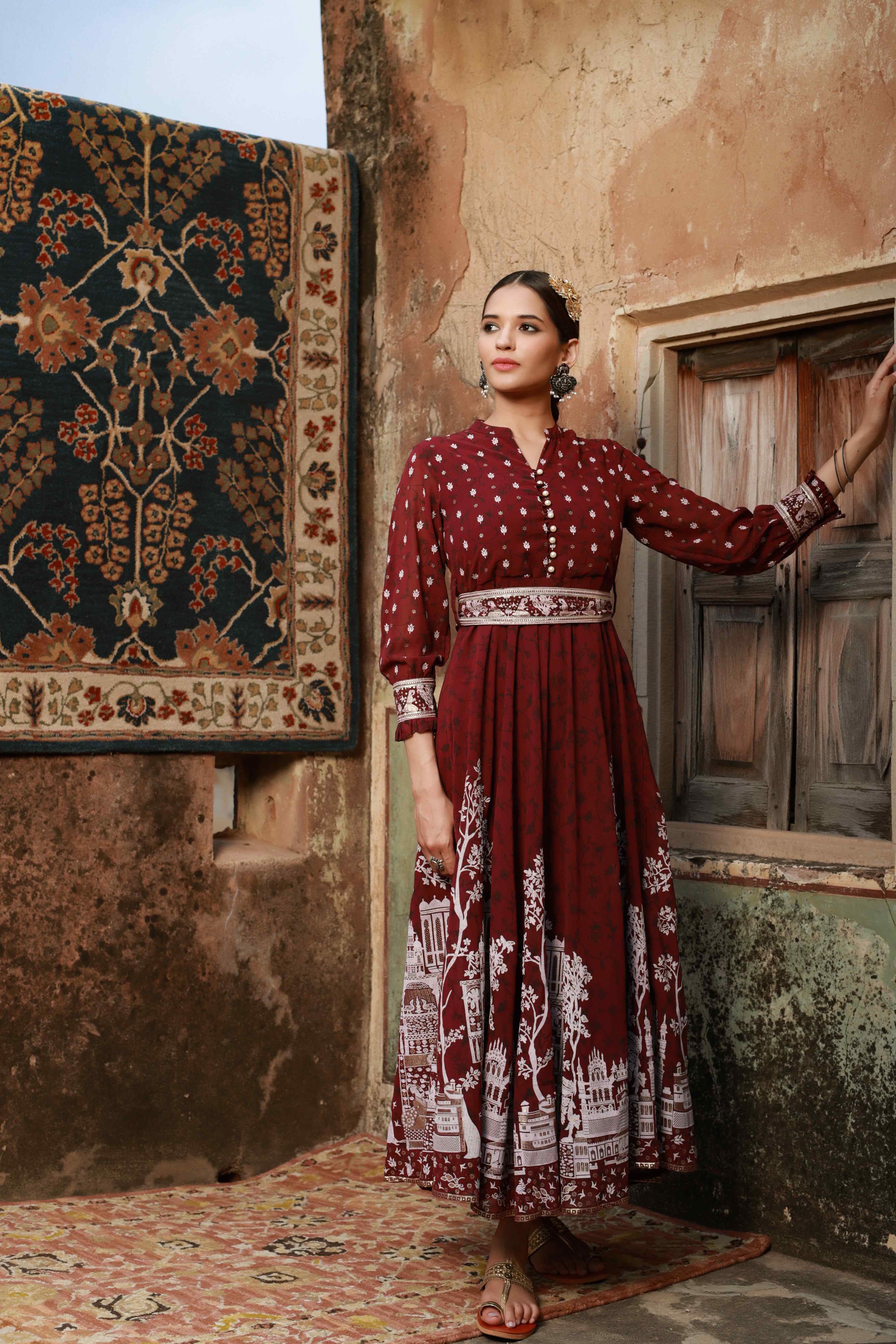 Wine Ethnic Motif Printed Georgette Flared Maxi Dress | DesiQlo