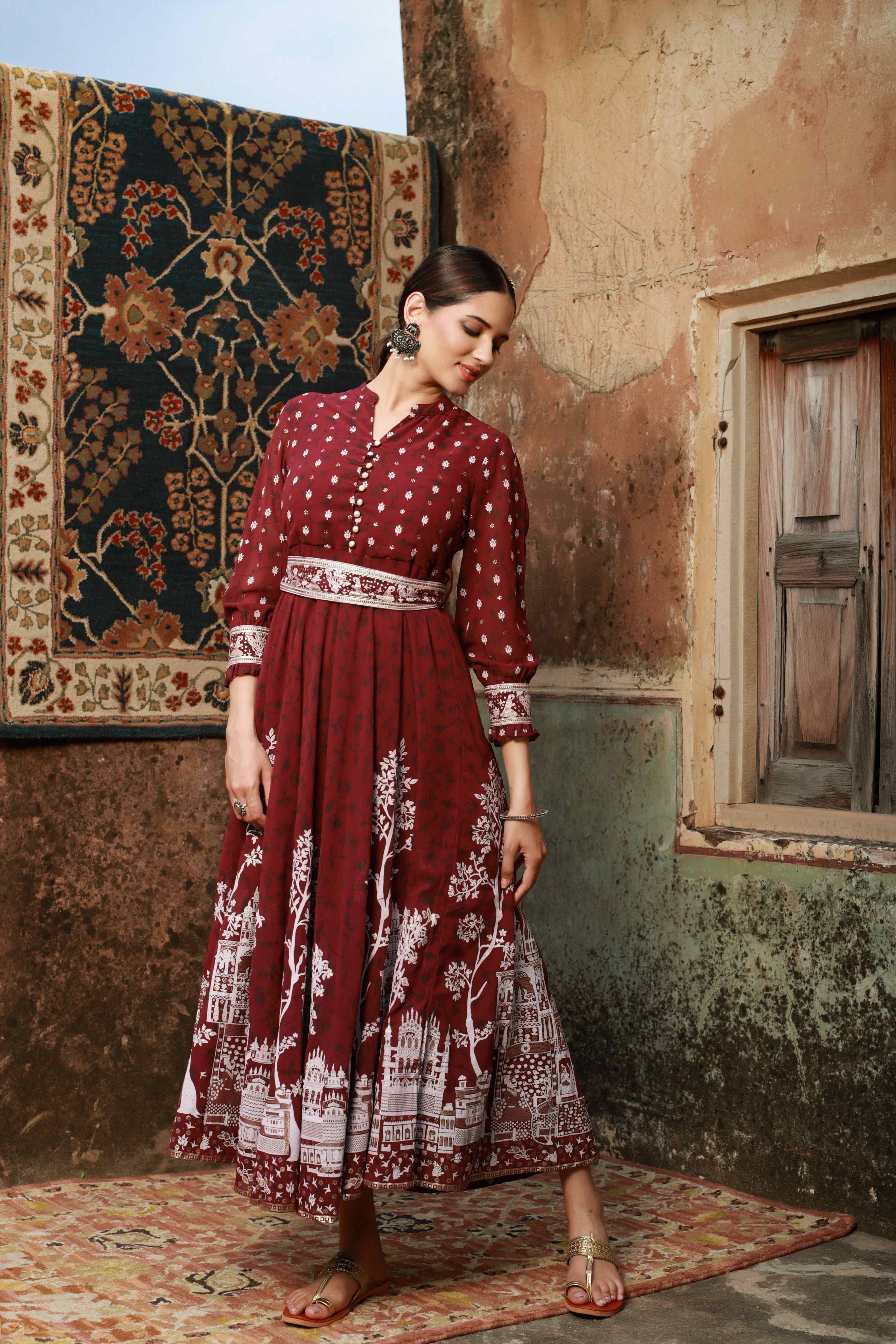 Wine Ethnic Motif Printed Georgette Flared Maxi Dress | DesiQlo