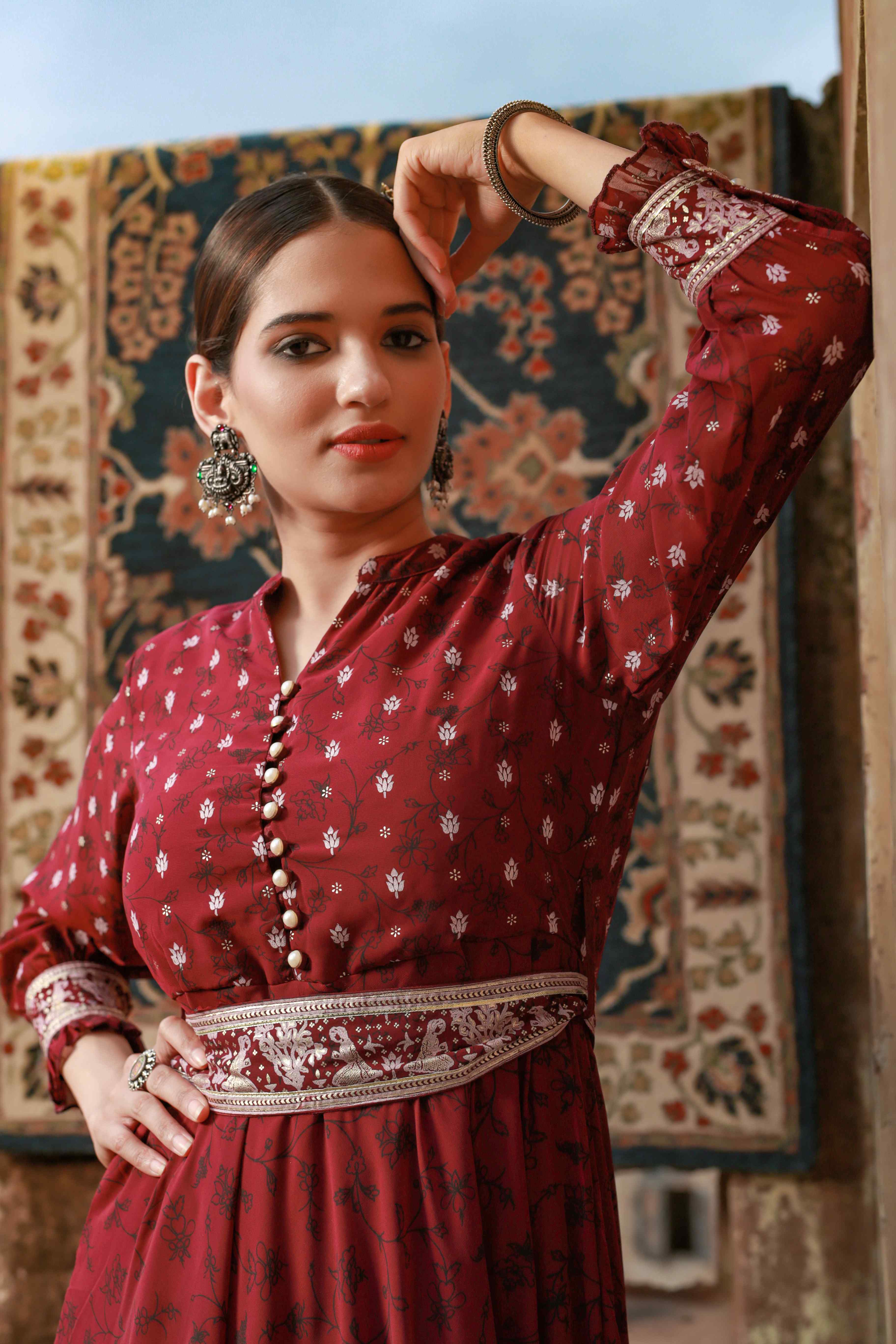 Wine Ethnic Motif Printed Georgette Flared Maxi Dress | DesiQlo