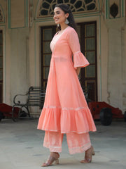 Women's Peach Rayon Solid With Printed Flared Kurta Sets