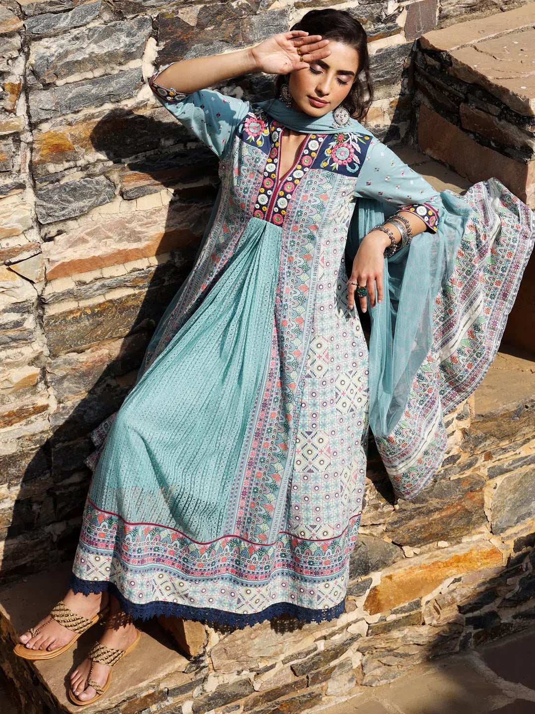 Women Sky-Blue Cotton Cambric Tribal Printed with Embroidered Flared Kurta & Dupatta Set.