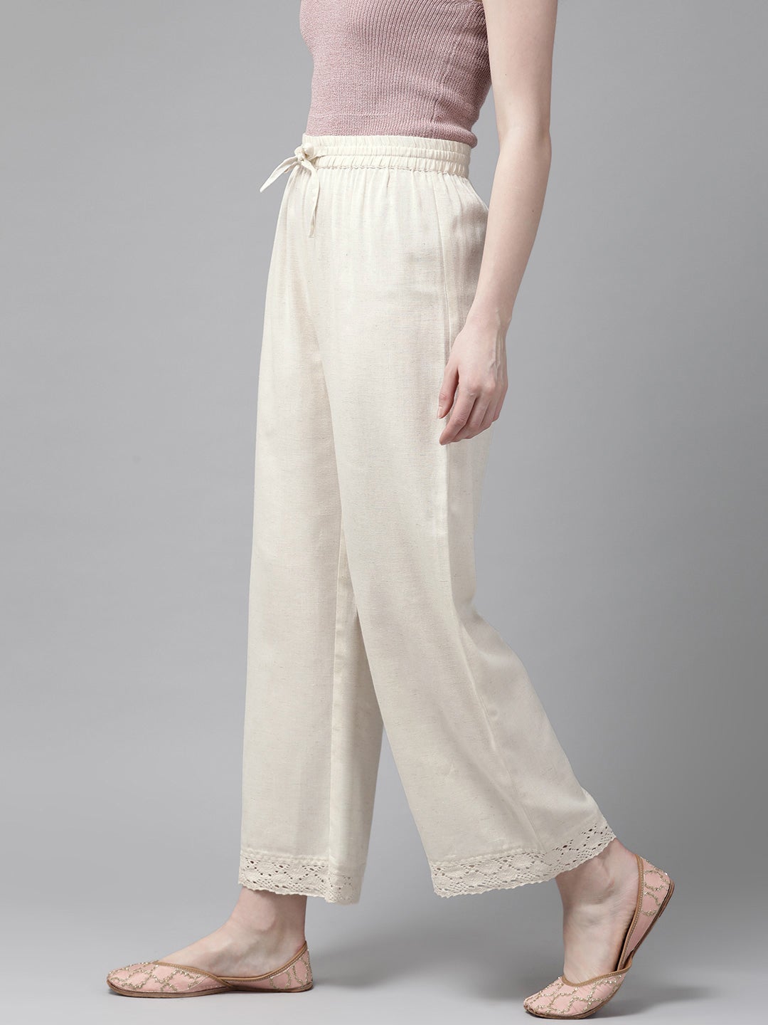Off-White Solid Rayon Flex Wide Leg Women Palazzo With Lace & Tassels 