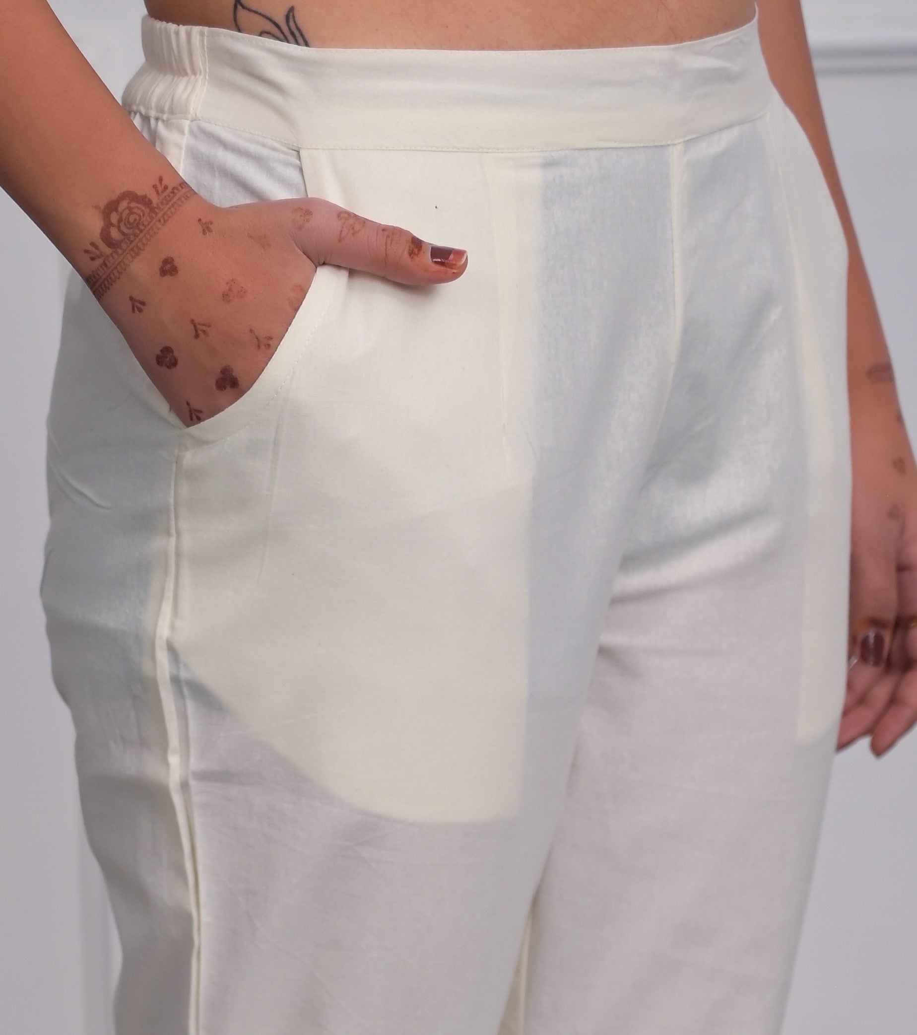 White Solid Cotton Pants With Partially Elasticated Waistband And Two 