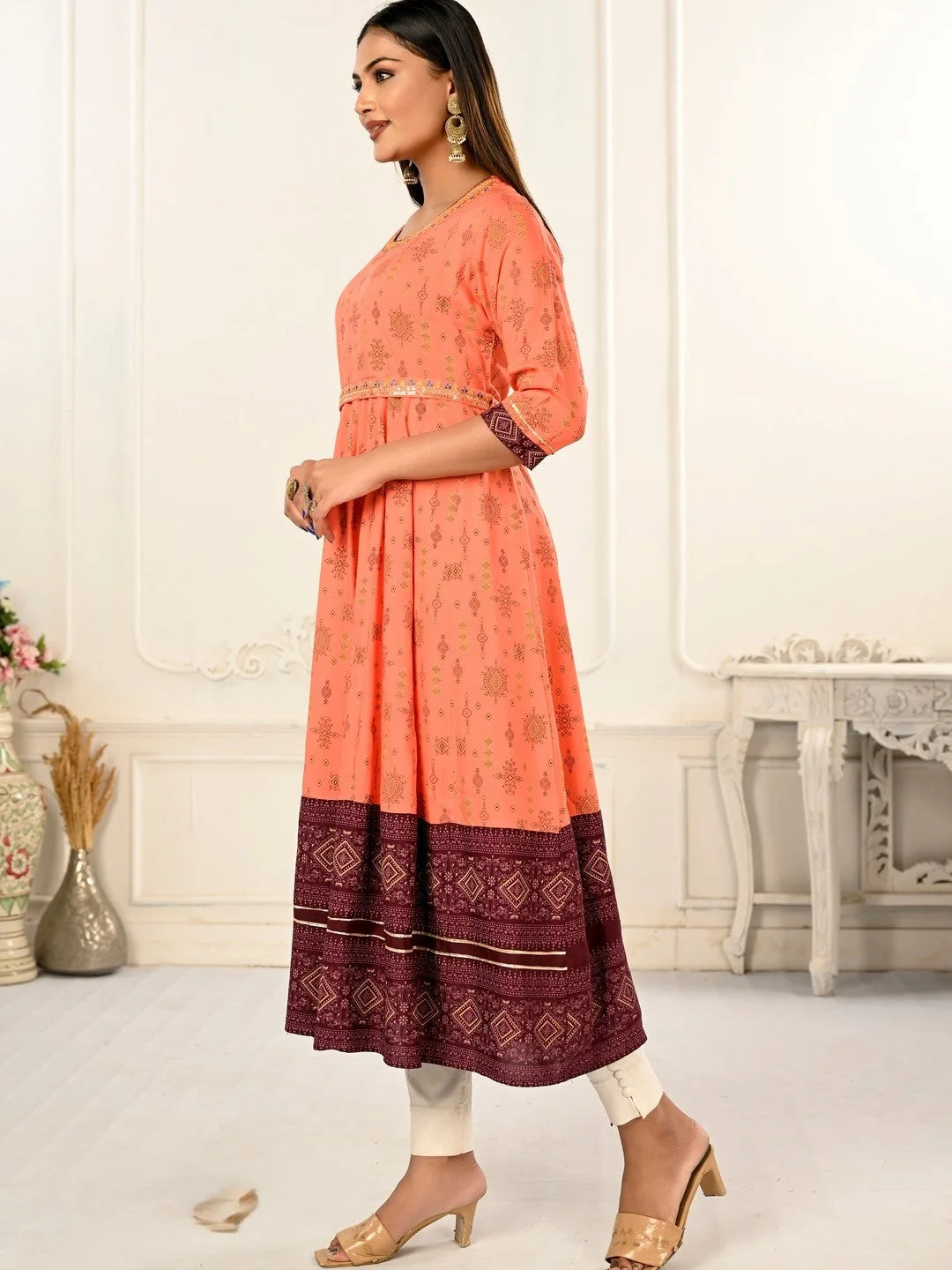 Orange Colour cotton hand print kurti with vibrant patterns