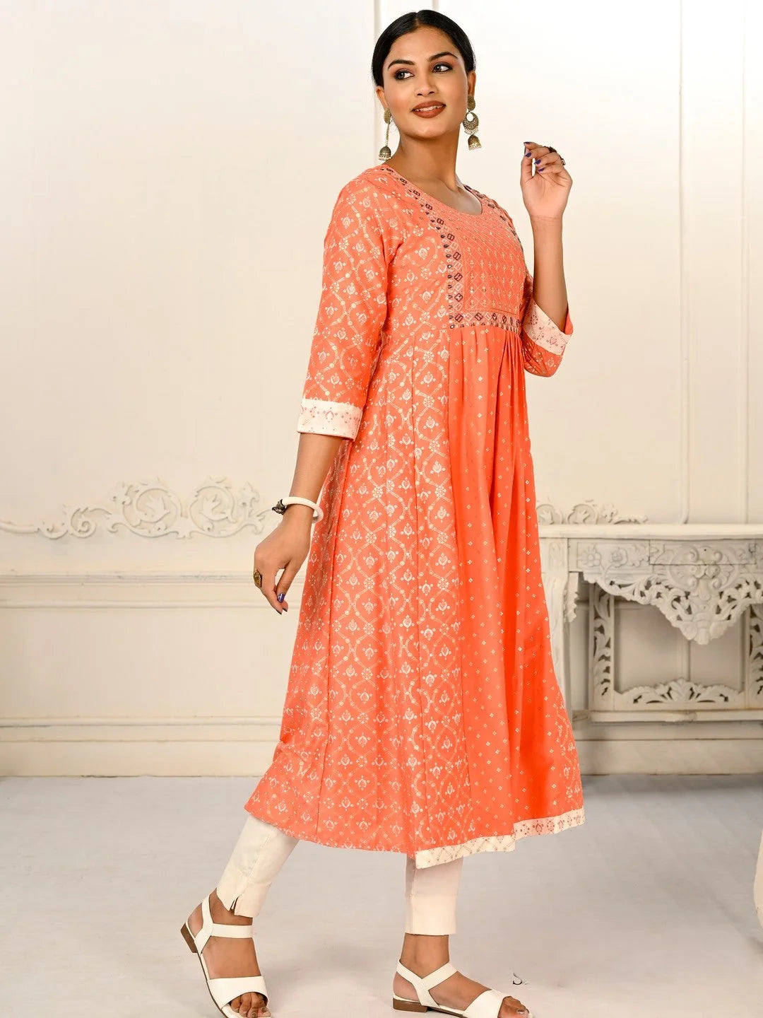 Orange Colour cotton hand print kurti with vibrant patterns