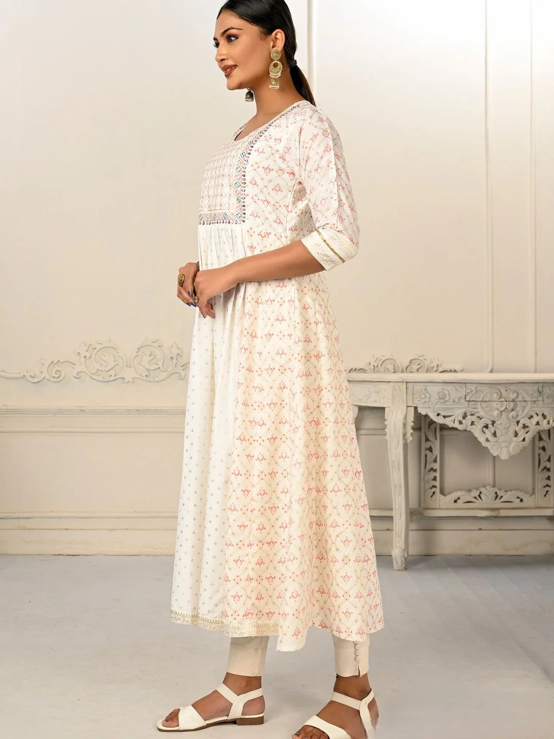 White Colour cotton hand print kurti with vibrant patterns