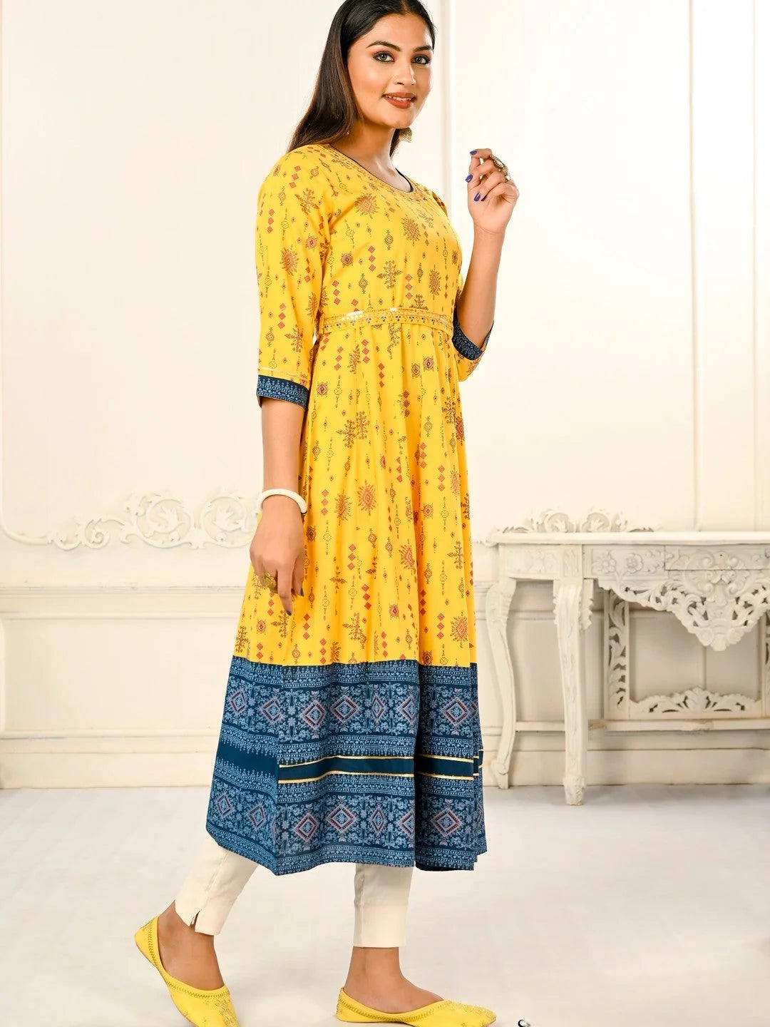 Yellow Colour cotton hand print kurti with vibrant patterns