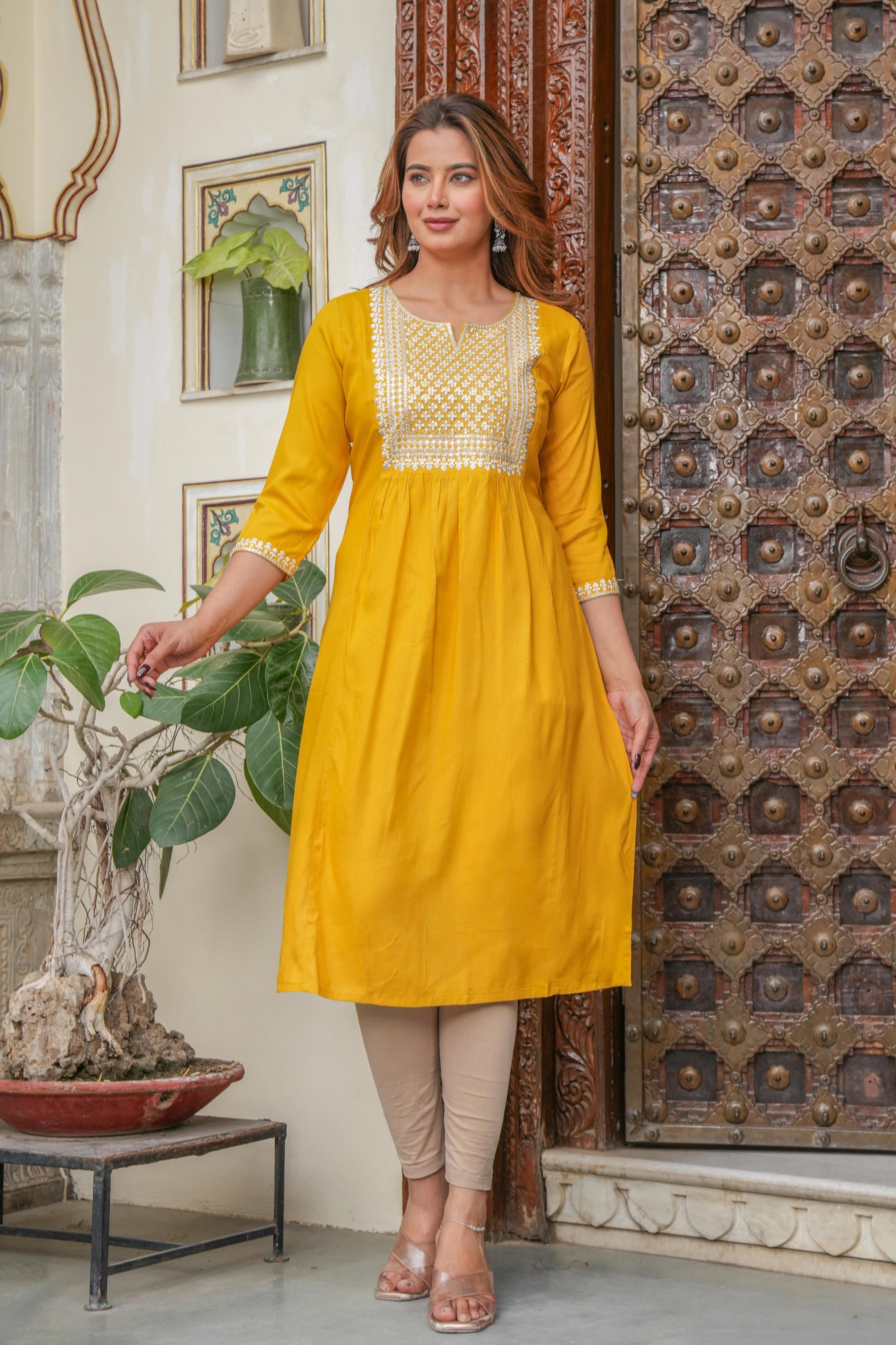Women  Mustard  Solid With Embroidered Straight Kurta