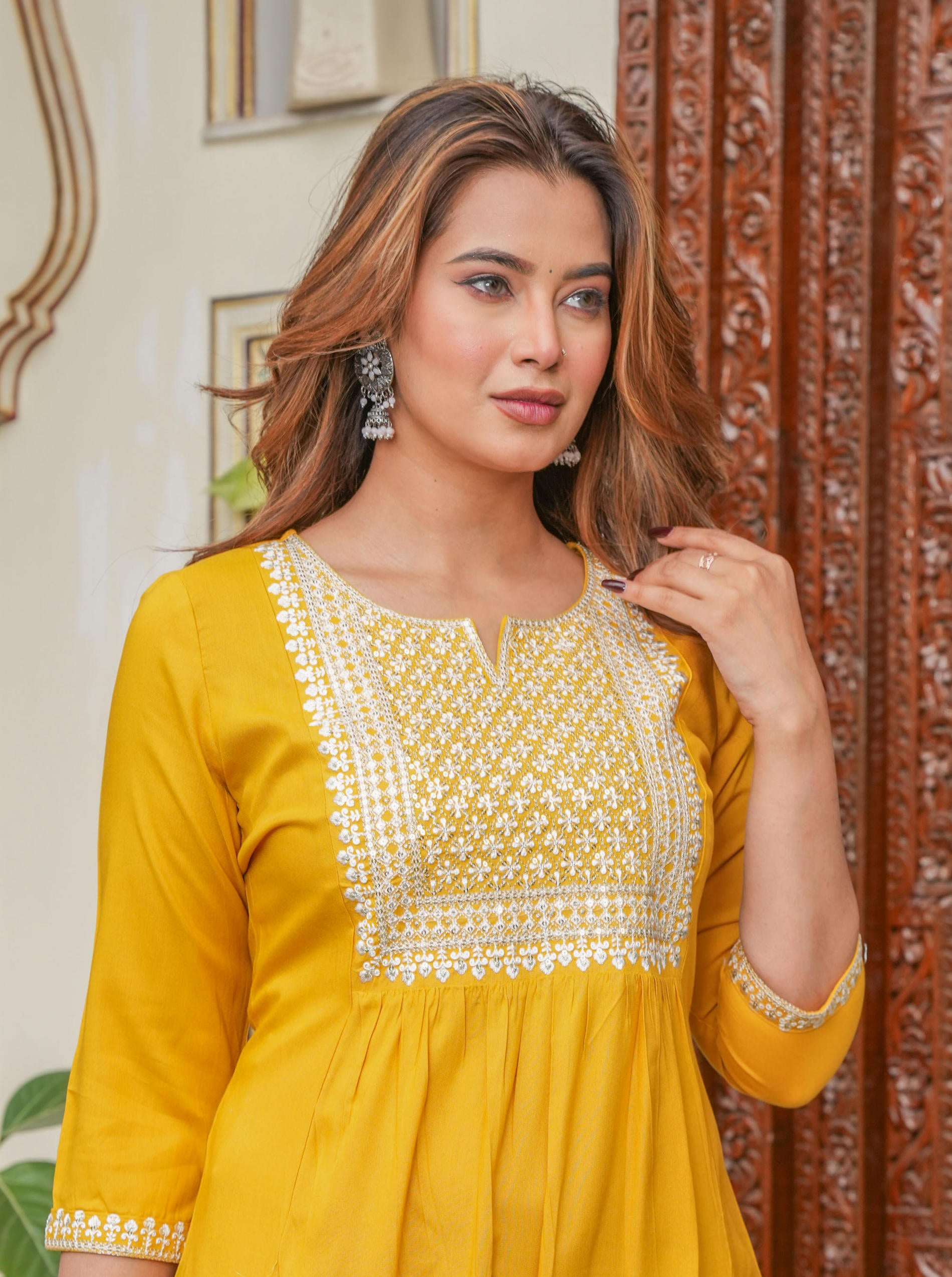 Women  Mustard  Solid With Embroidered Straight Kurta