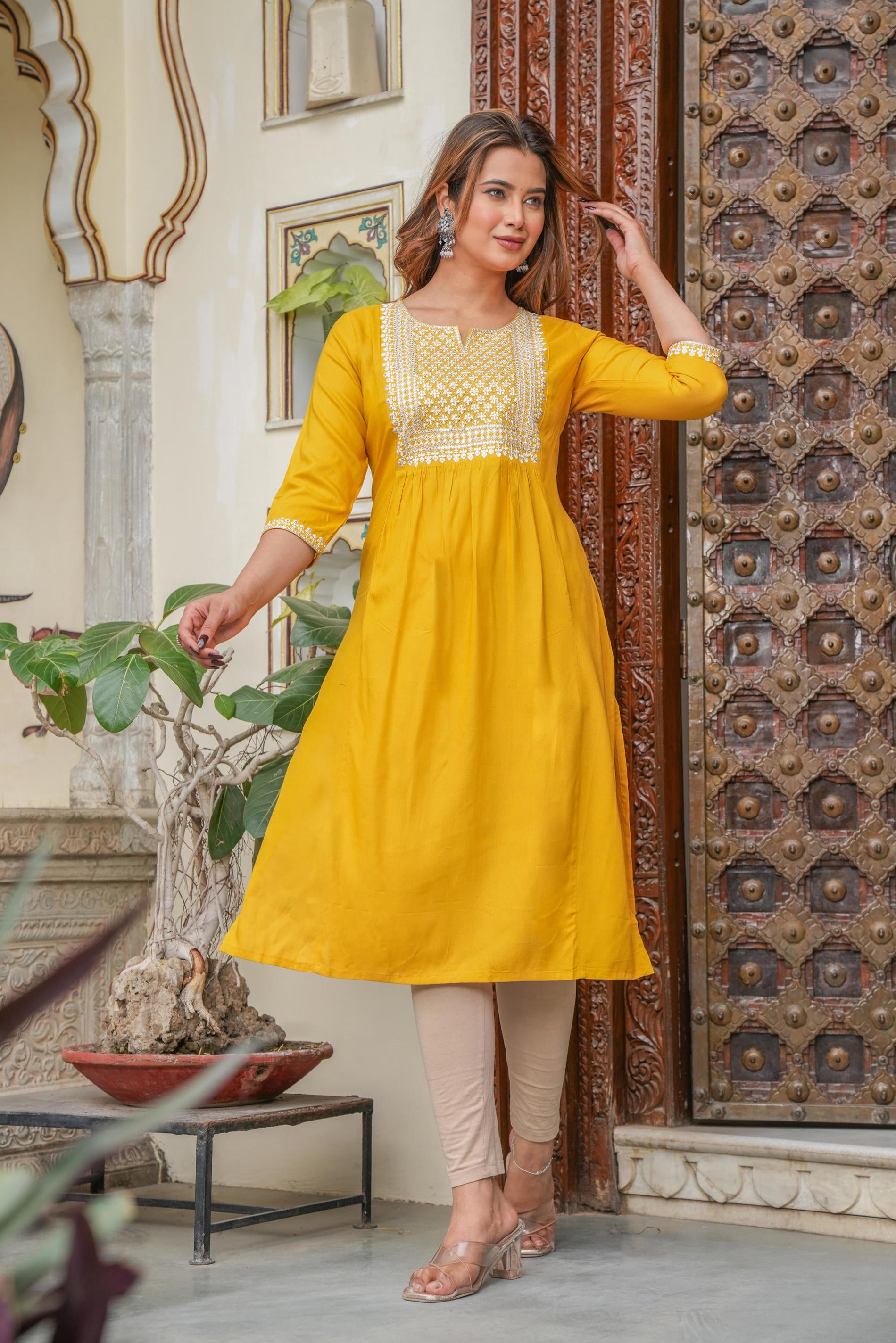 Women  Mustard  Solid With Embroidered Straight Kurta