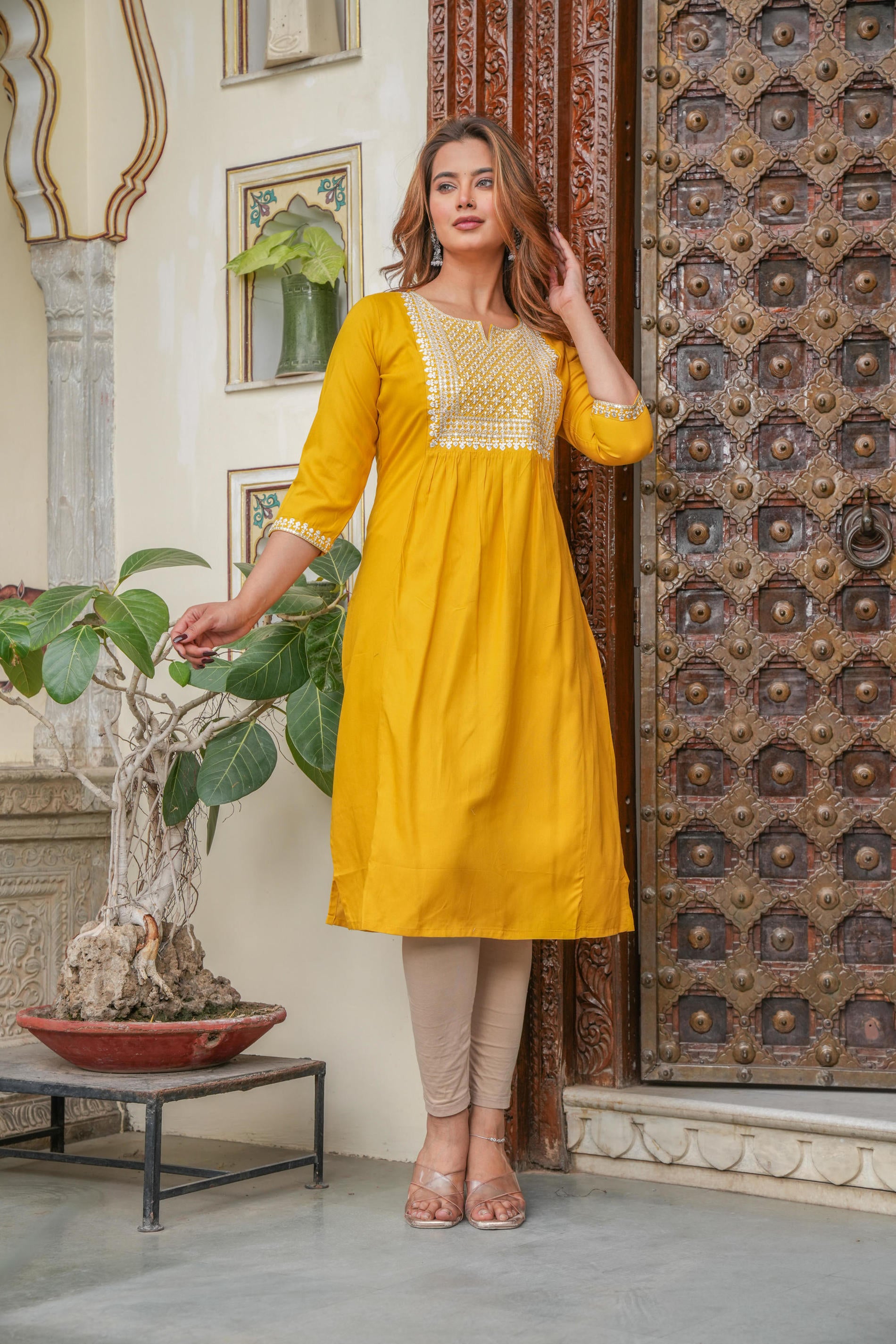 Women  Mustard  Solid With Embroidered Straight Kurta