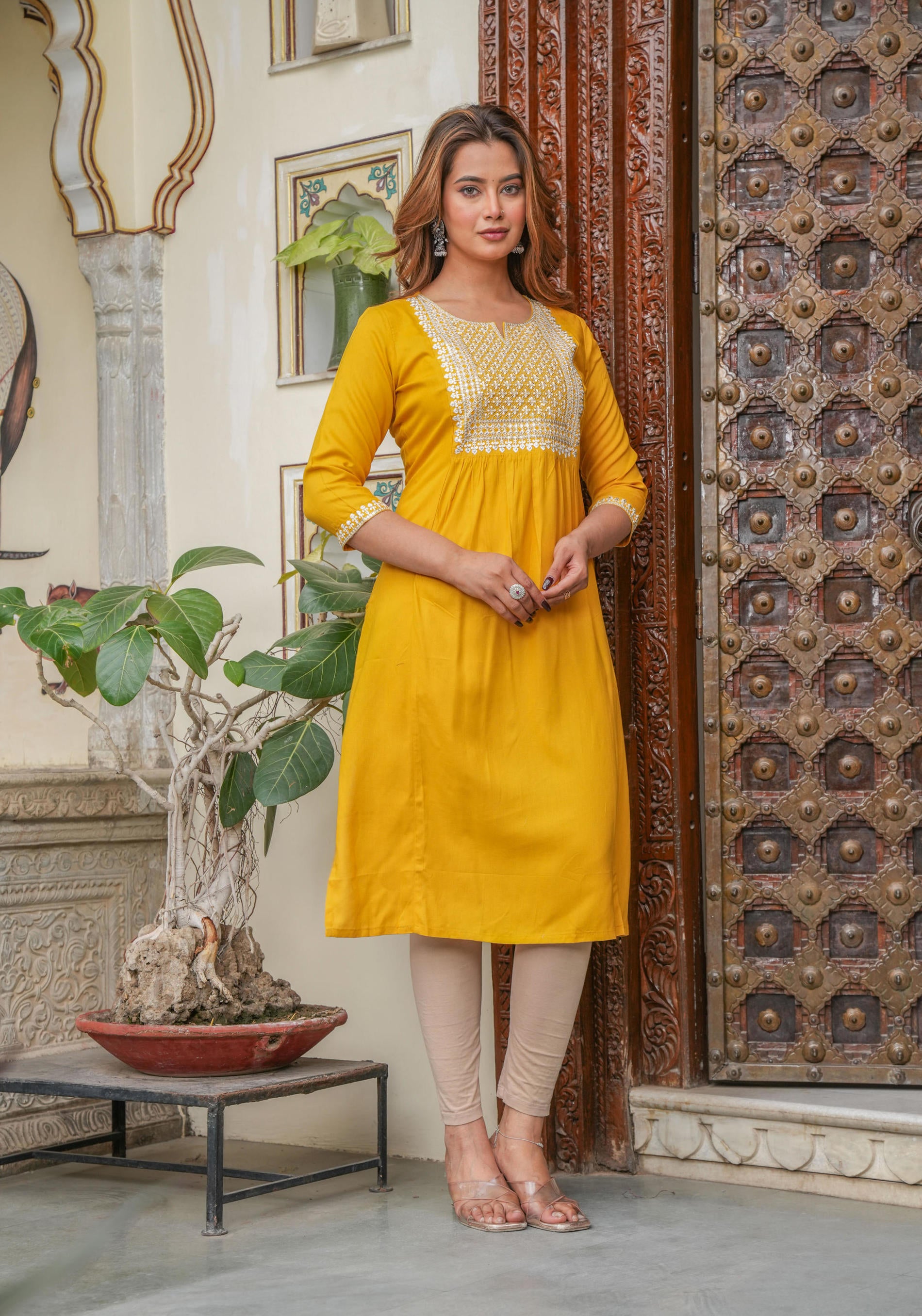 Women  Mustard  Solid With Embroidered Straight Kurta