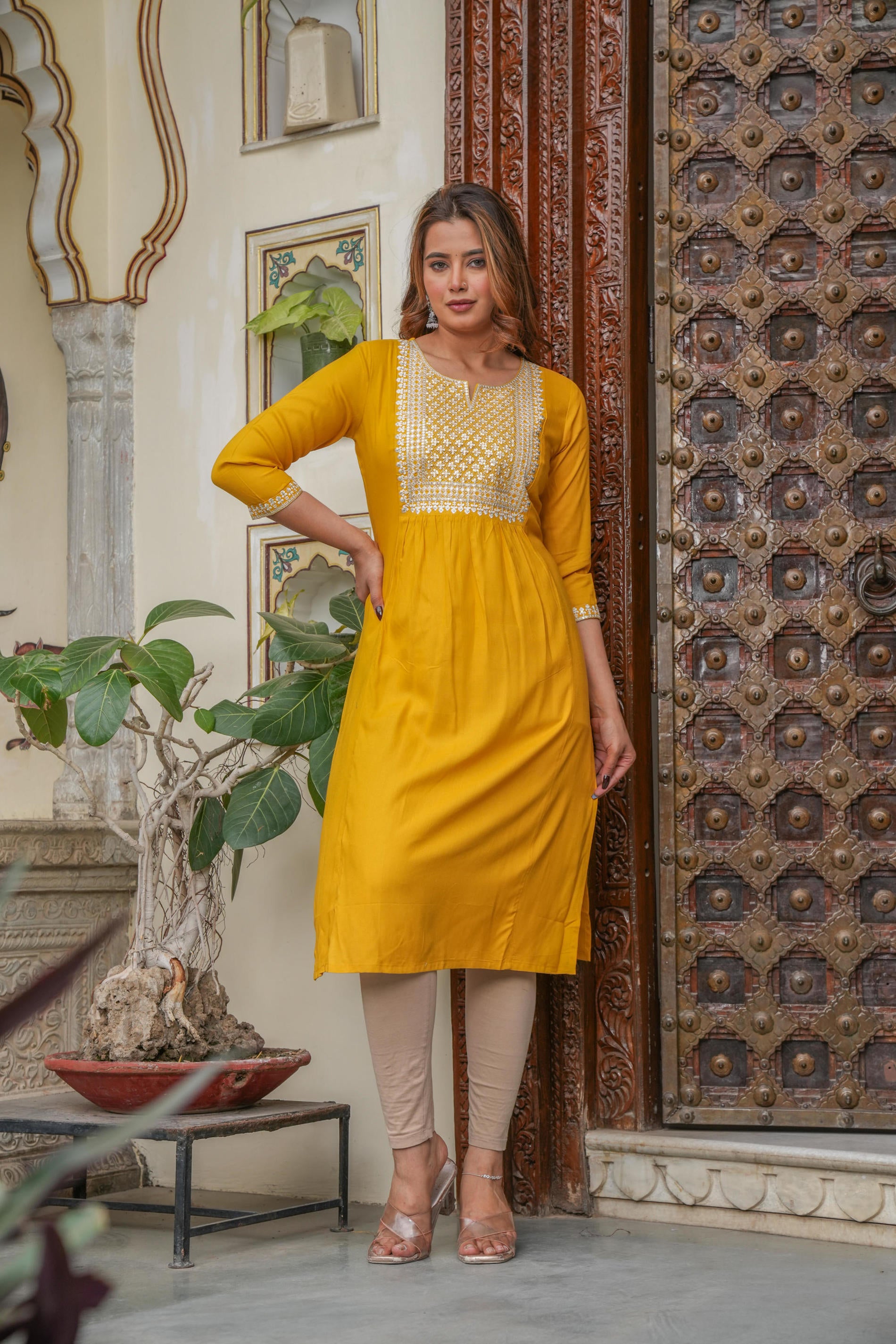 Women  Mustard  Solid With Embroidered Straight Kurta