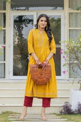 Mustard Floral Printed Cotton Kurta With Thread Work & Lace