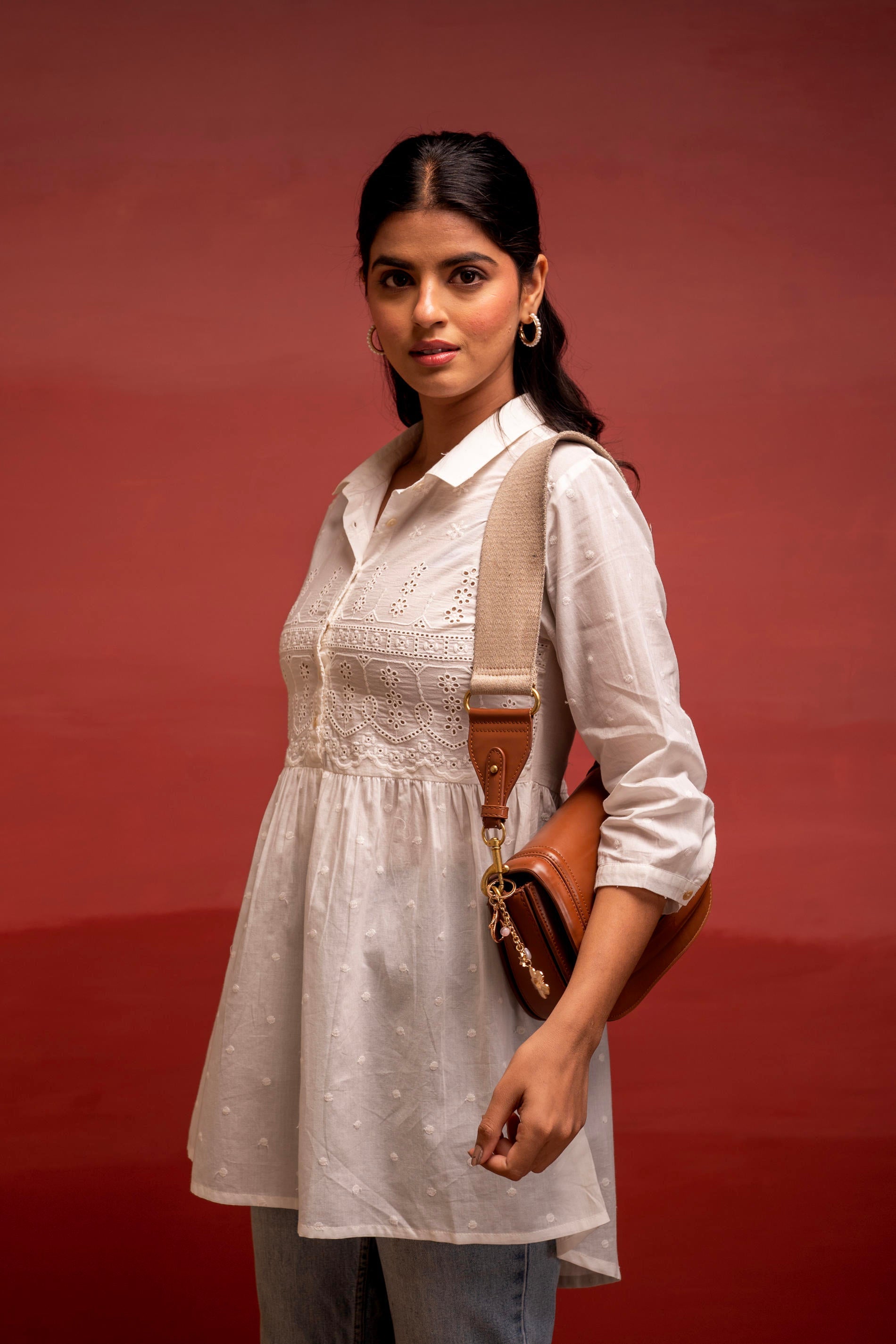 White Solid Cotton Tunic with Schiffli Work and Button Detailing | Des