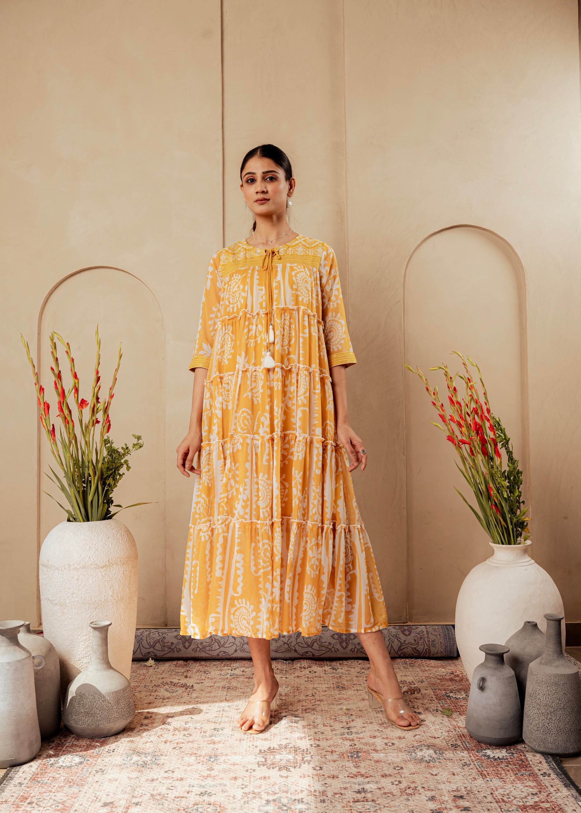 Mustard Ethnic Motifs Printed Man Made Fiber Tiered Long Dress | DesiQ