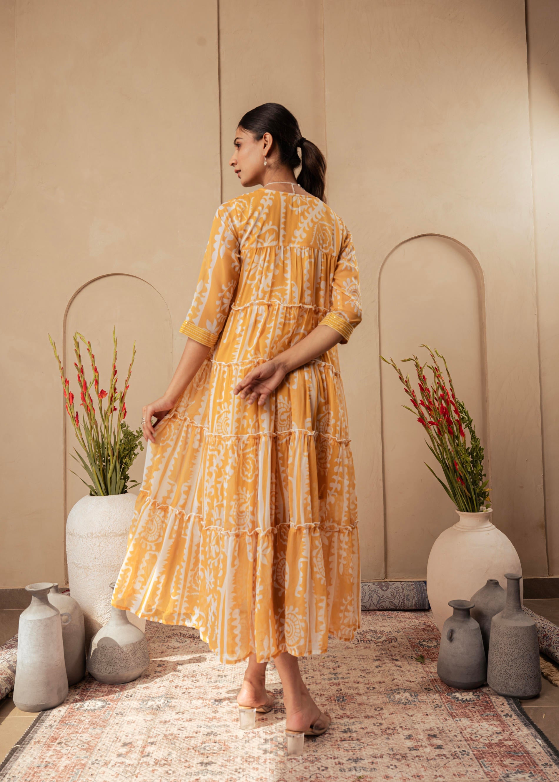 Mustard Ethnic Motifs Printed Man Made Fiber Tiered Long Dress | DesiQ