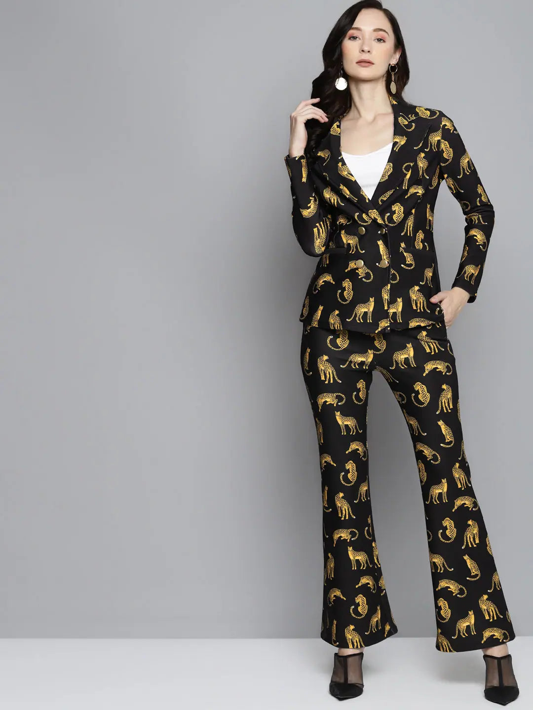 Black Scuba Cheetah Bell Bottom Pants - Women's Bottoms