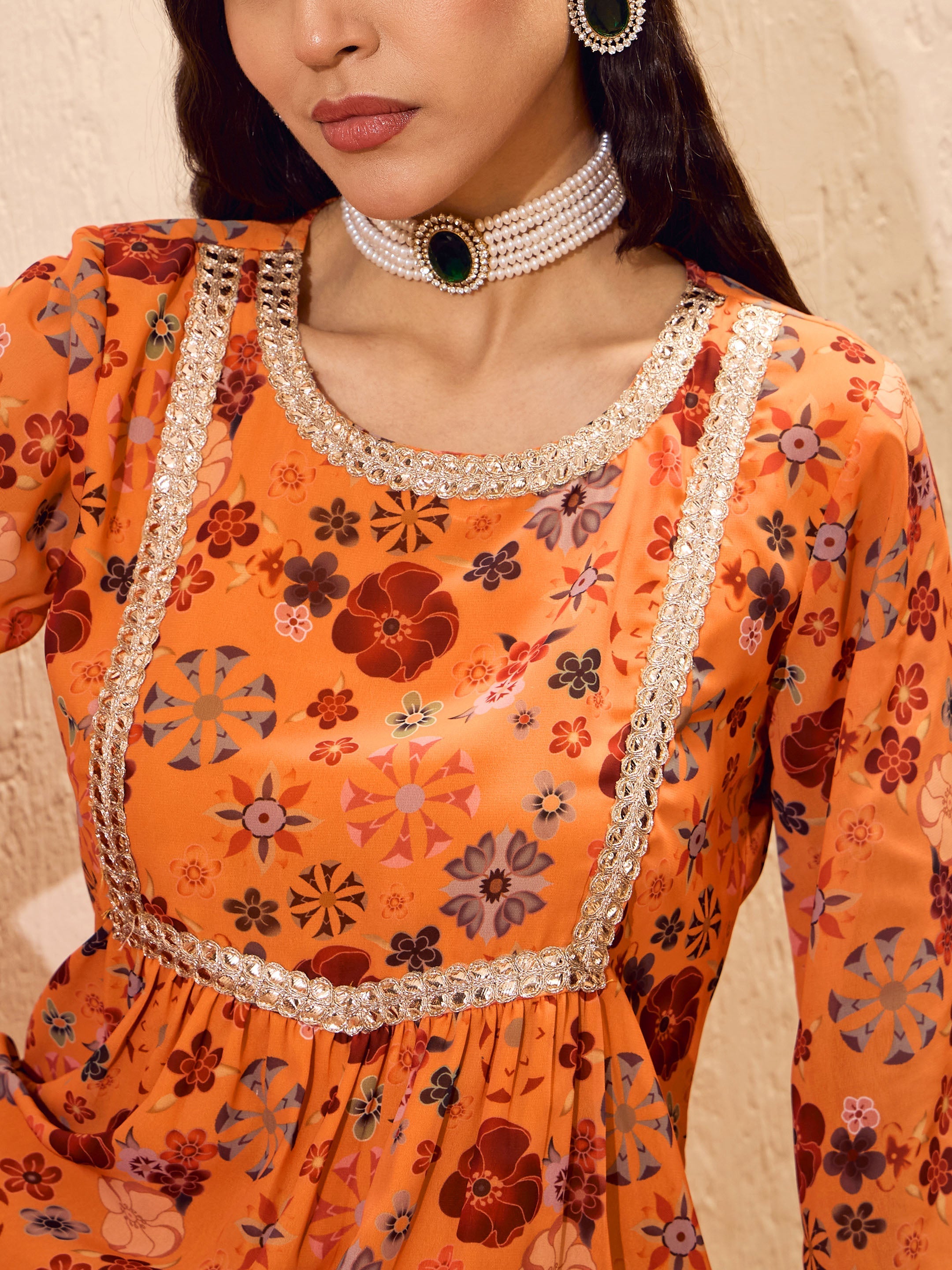 Women Orange Floral Short Kurta With Sharara Pants-SHSET96174