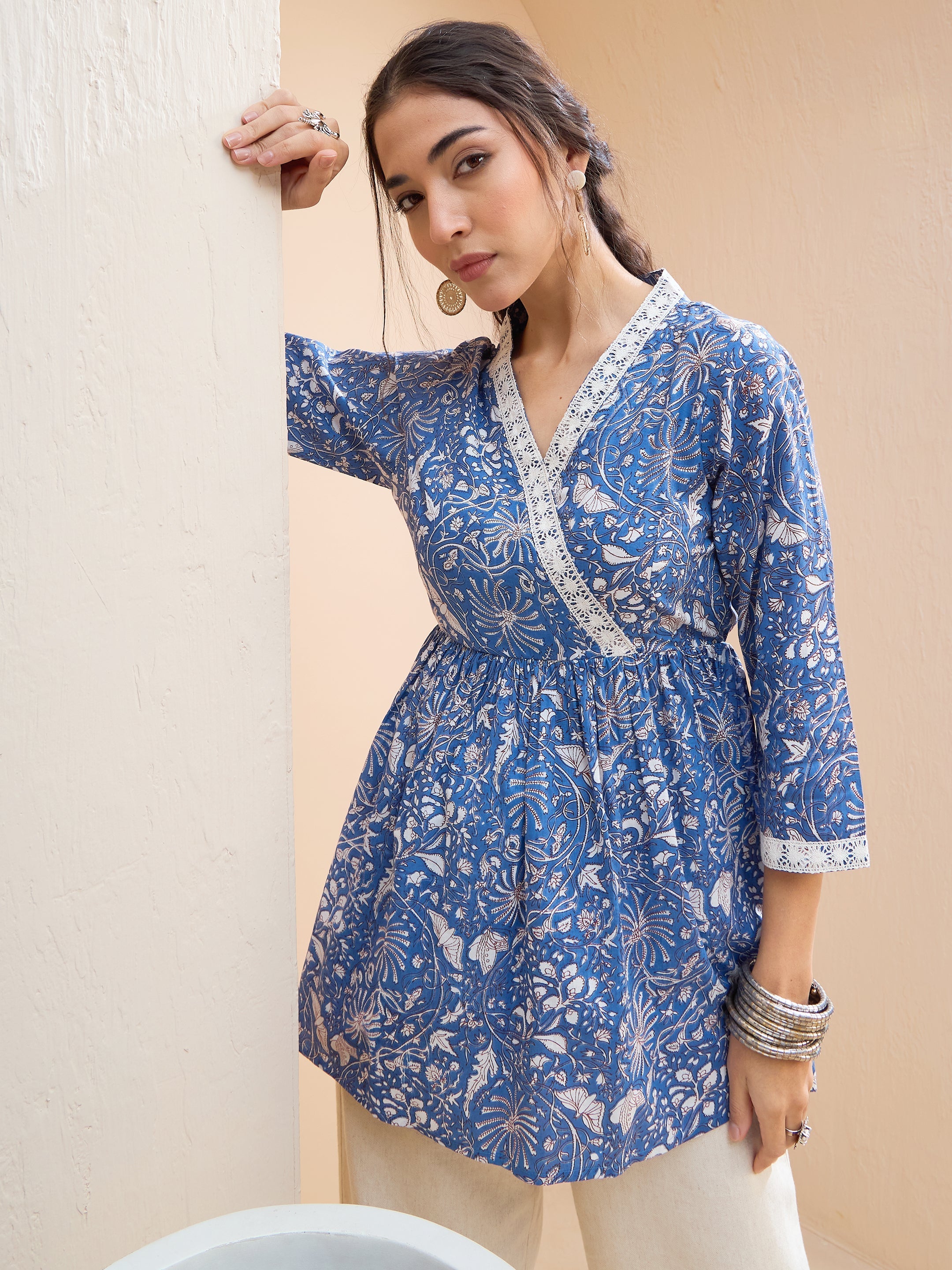Women Blue Floral Cambric Wrap Peplum Kurti-SHTOP42207