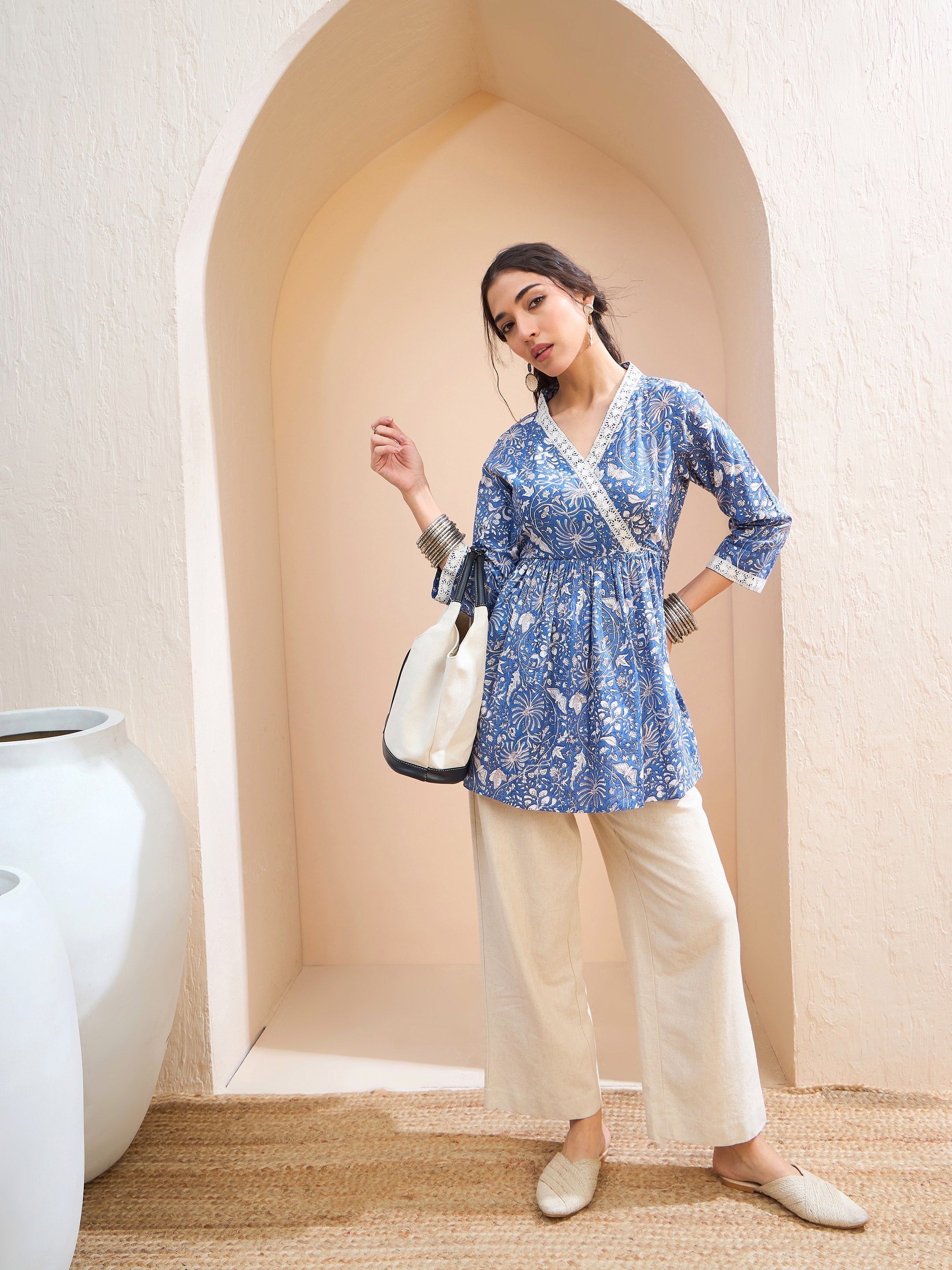 Women Blue Floral Cambric Wrap Peplum Kurti-SHTOP42207