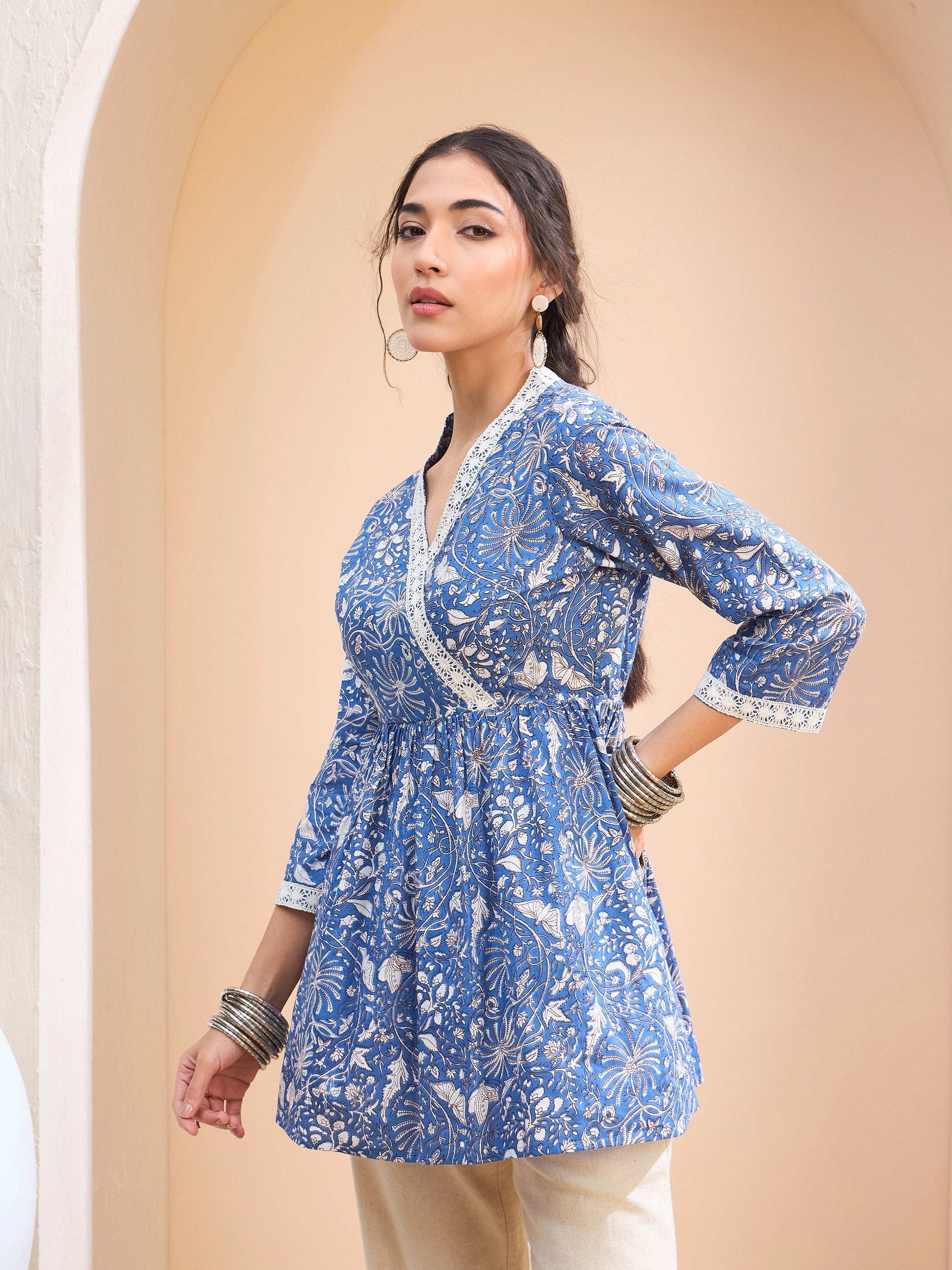 Women Blue Floral Cambric Wrap Peplum Kurti-SHTOP42207