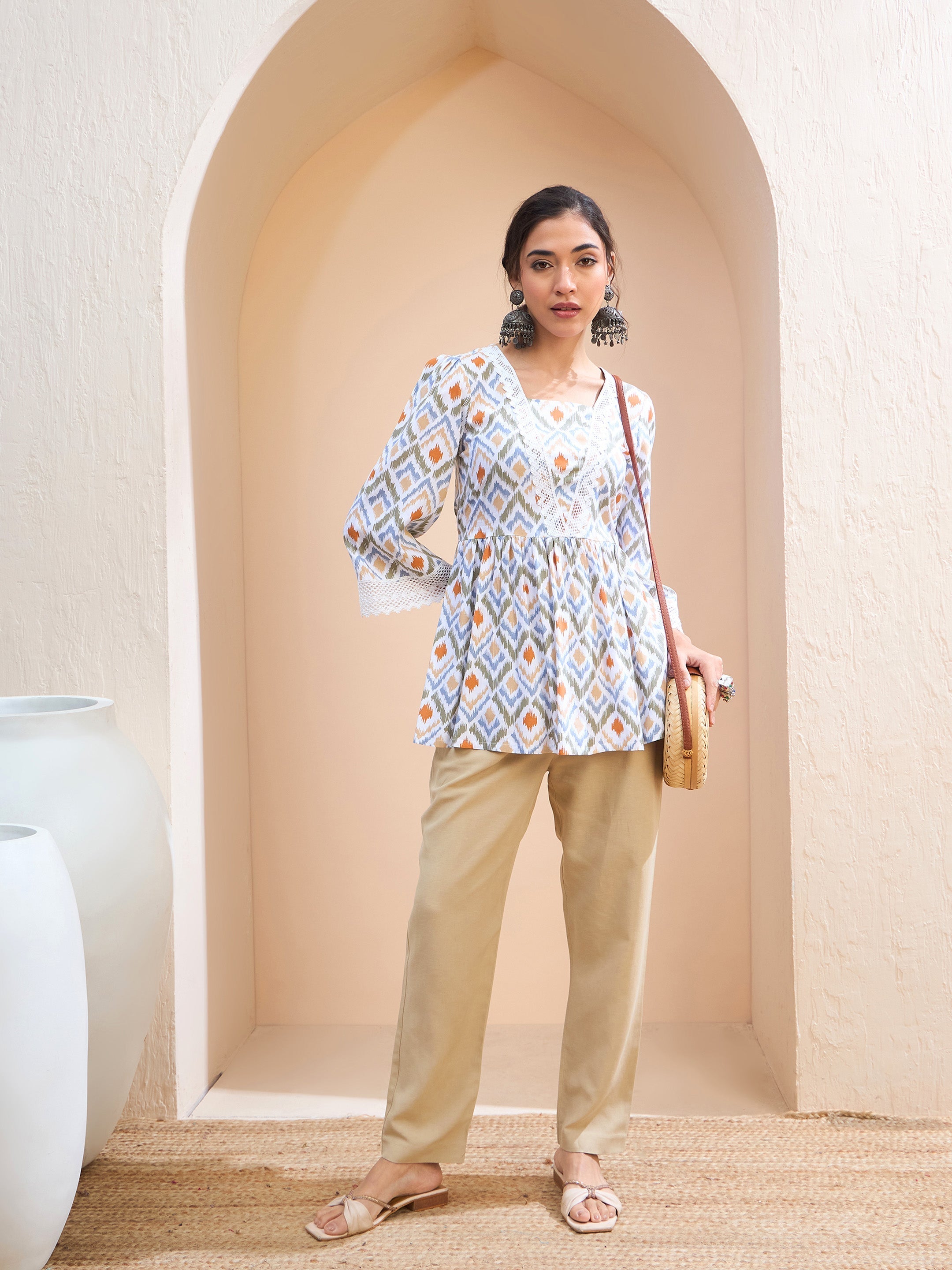 Women White Geometric Print Peplum Kurti-SHTOP42215