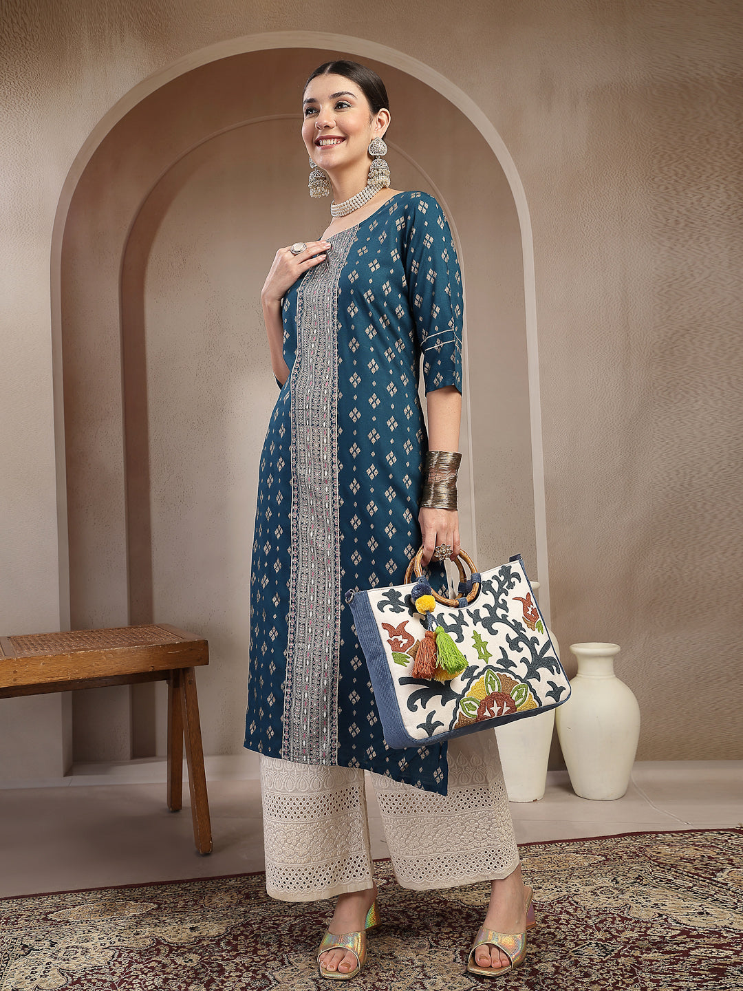 Women's Teal Solid Embroidered Rayon Straight Kurta (TEALKIMCHI) | Des