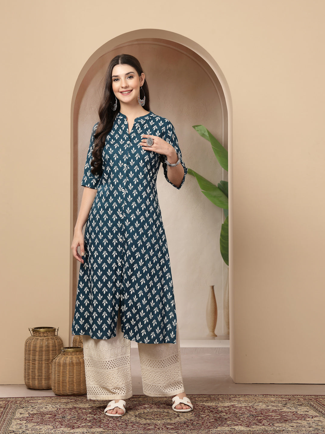 Women's Teal Ethnic Motifs Printed Rayon A-Line Kurta (TEALTHUNDER) | 