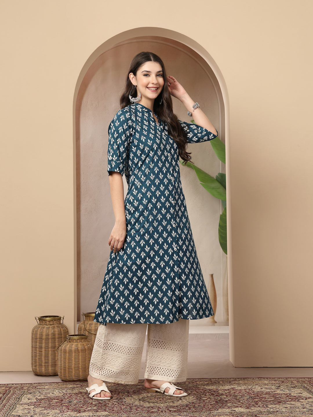 Women's Teal Ethnic Motifs Printed Rayon A-Line Kurta (TEALTHUNDER) | 