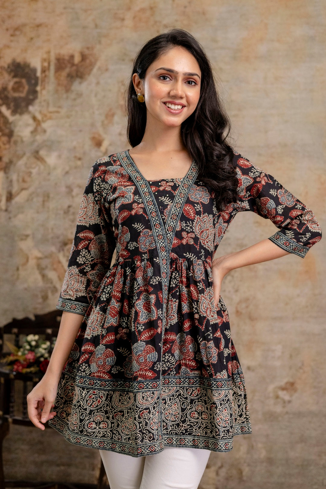 Women's Black Floral Printed Cotton Peplum Top (TOPBLACKNOVA) | DesiQl