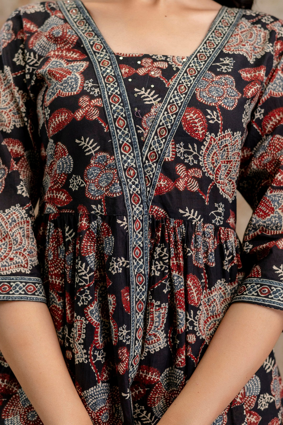 Women's Black Floral Printed Cotton Peplum Top (TOPBLACKNOVA) | DesiQl