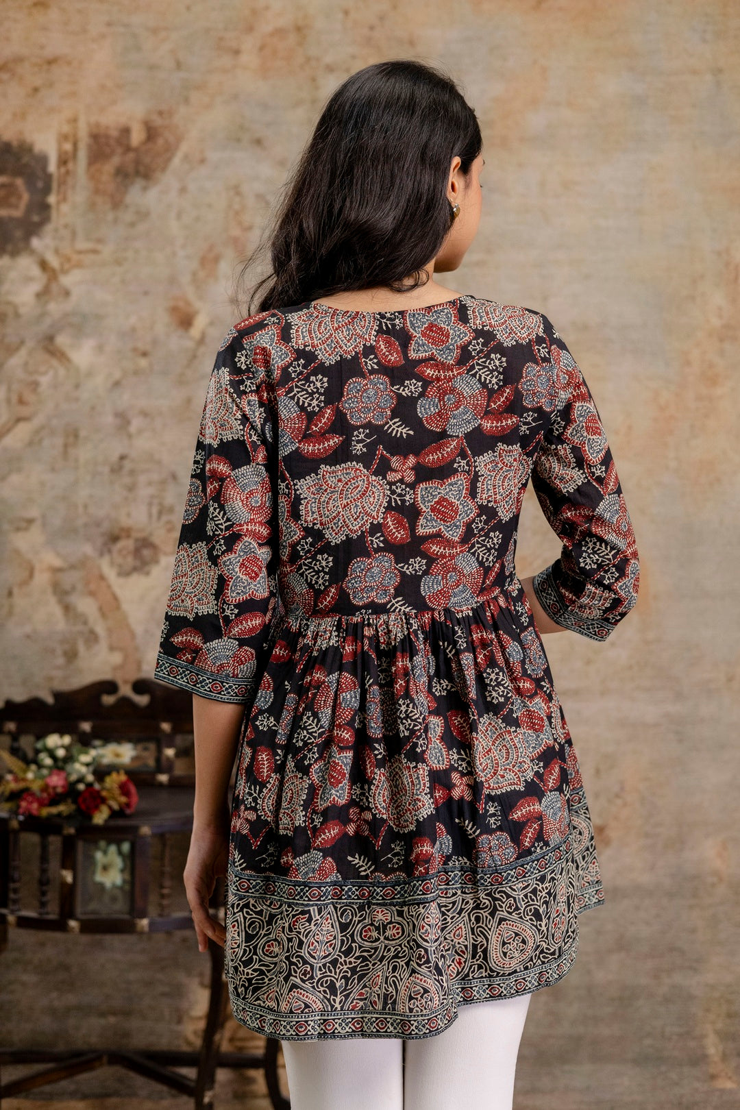 Women's Black Floral Printed Cotton Peplum Top (TOPBLACKNOVA) | DesiQl