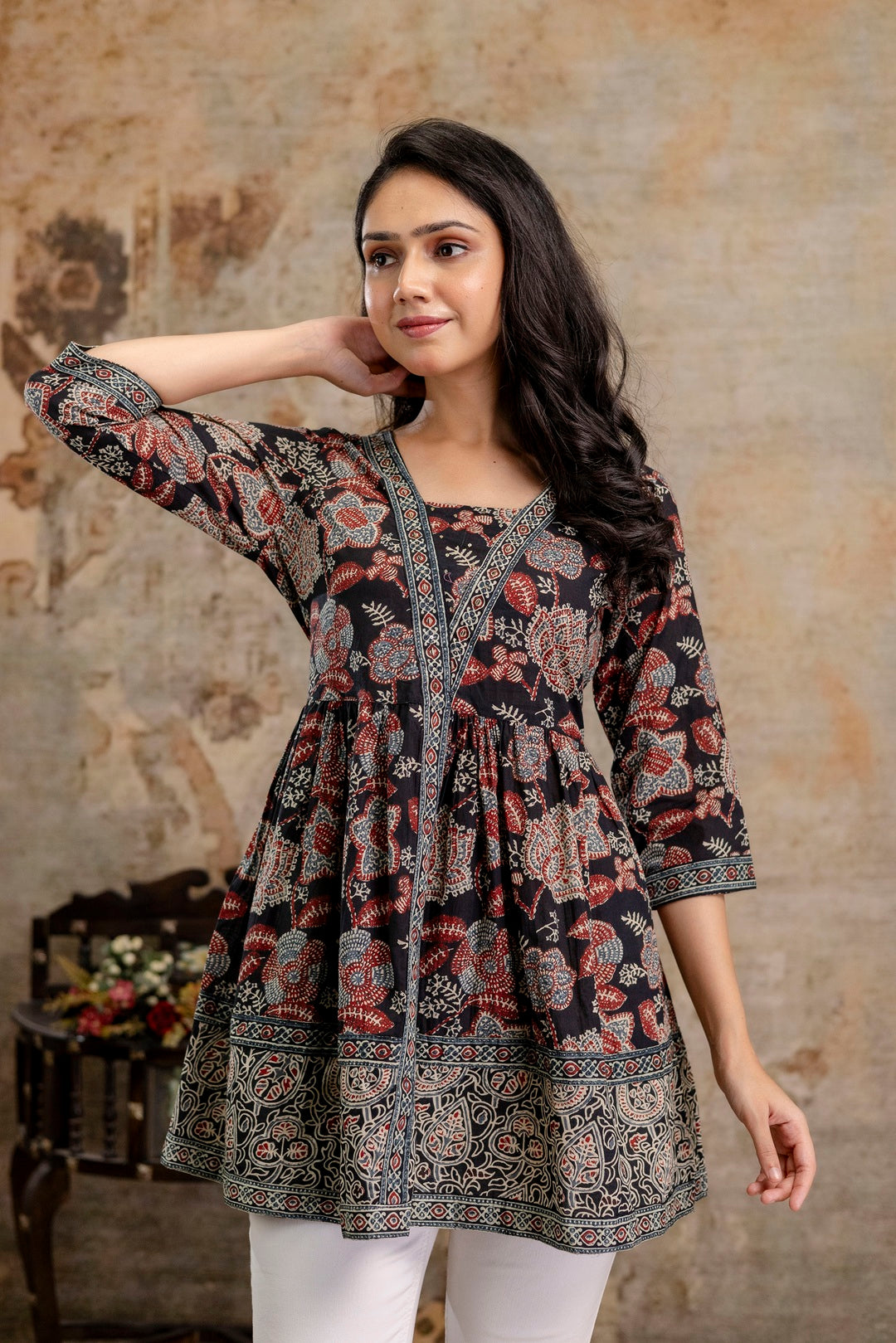 Women's Black Floral Printed Cotton Peplum Top (TOPBLACKNOVA) | DesiQl