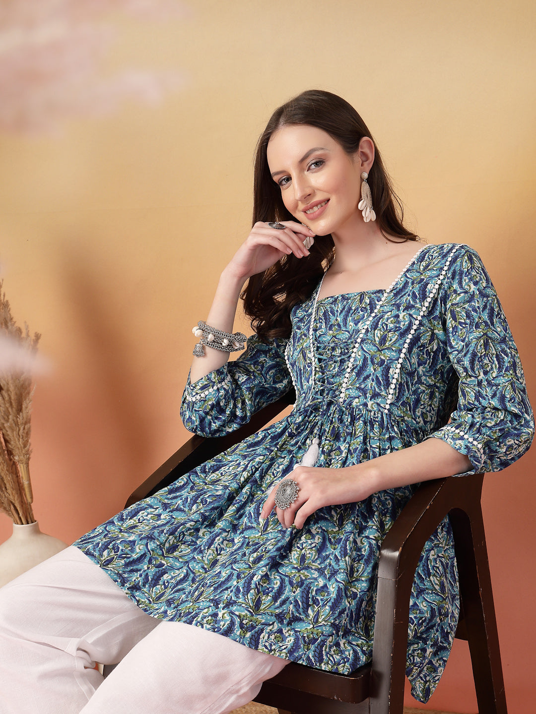 Women's Blue Floral Printed Rayon Peplum Top (TOPBLUEMUMTAZ) | DesiQlo