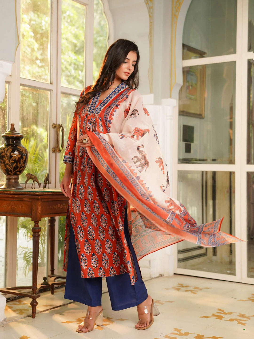 Women Orange Rayon Blend Floral Printed Straight Kurta Palazzos With Dupatta