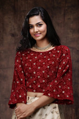 Gold Net Embellished Lehenga Choli Set