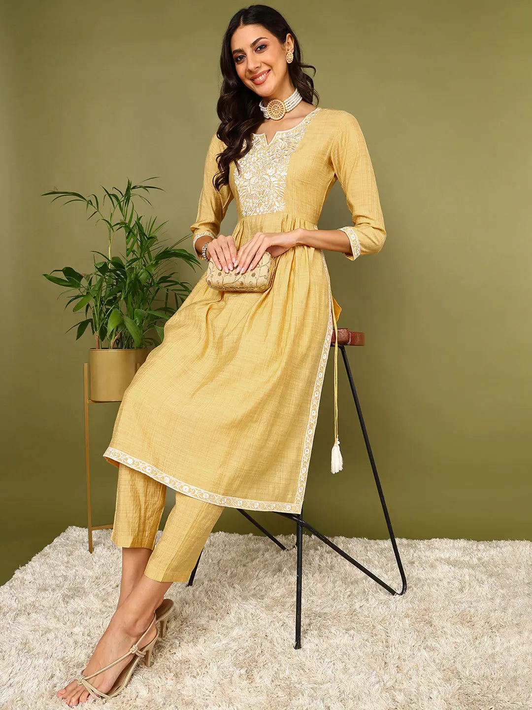 Women Yellow Silk Blend Solid Embroidered Kurta Palazzo
